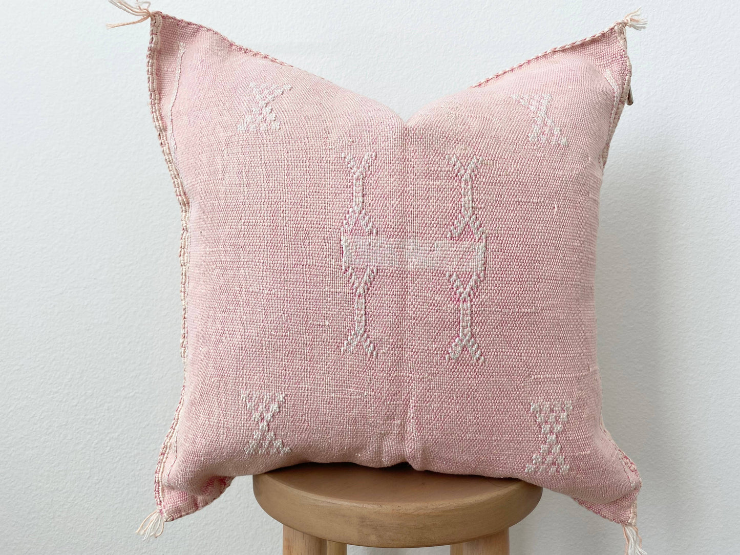 Pink Silk Sabrac Cushion Cover on timber stool