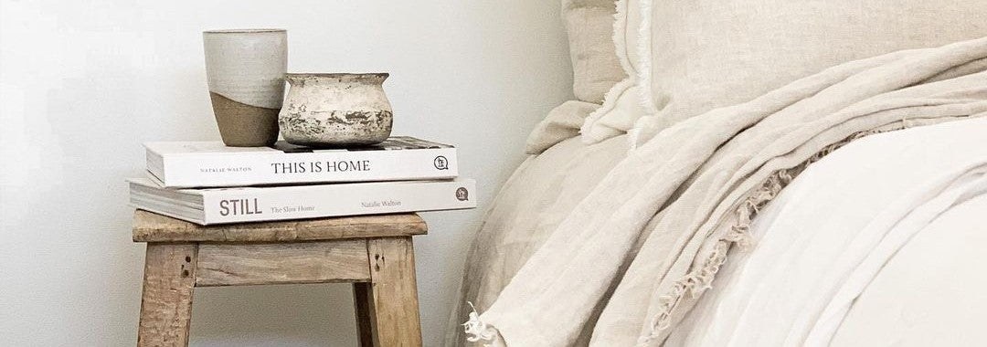 Cosy Bedroom Image with Fringed Linen Natural Cushions & Throws